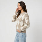 Women's argyle crew neck jumper in Beige | Langtoft – side view
