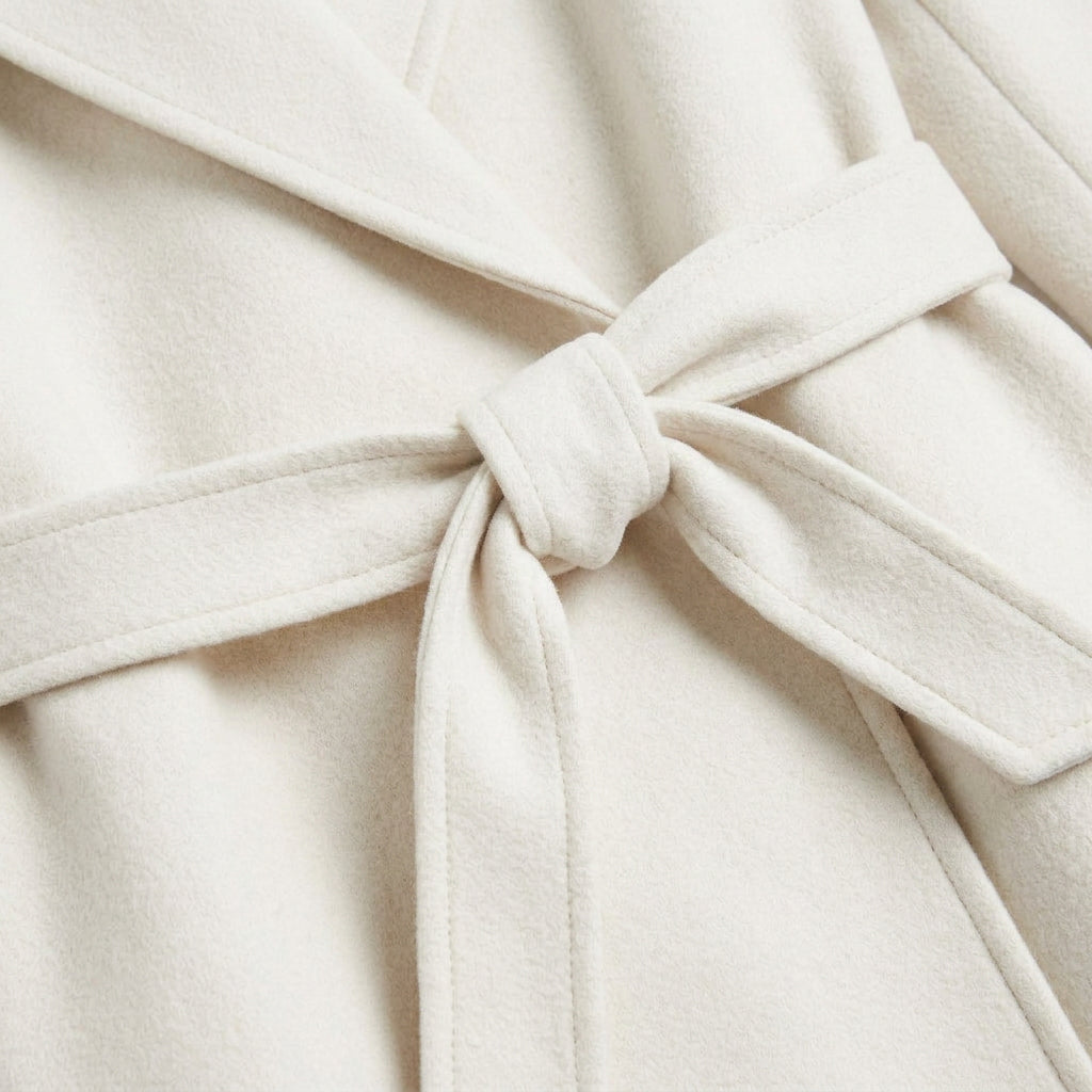 Women's Belted Wrap Coat in Ivory | Kettleburgh – detail view