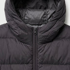Women's Longline Puffer Coat in Black | Idbury – detail view