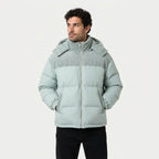 Men's corduroy hooded puffer jacket in Duck Egg | Ousby – front view