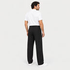 Men's Double-Pleat Trousers in Black | Wylam – back view