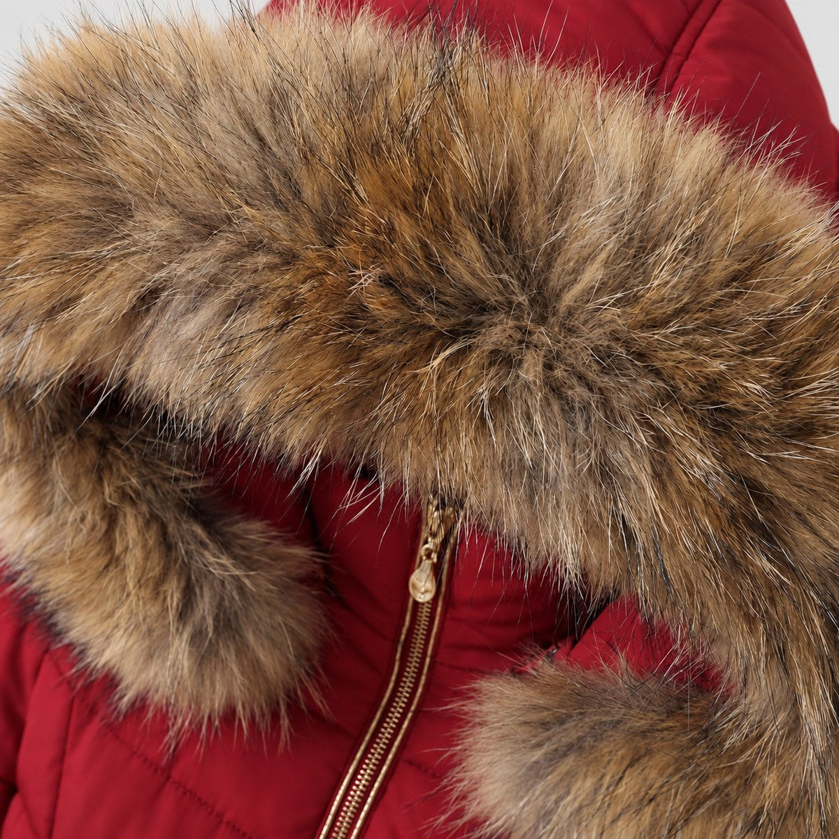 Women's fitted puffer coat in Red | Collyweston – detail view