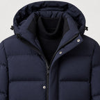 Men's longline hooded puffer coat in Navy | Rhossili – detail view