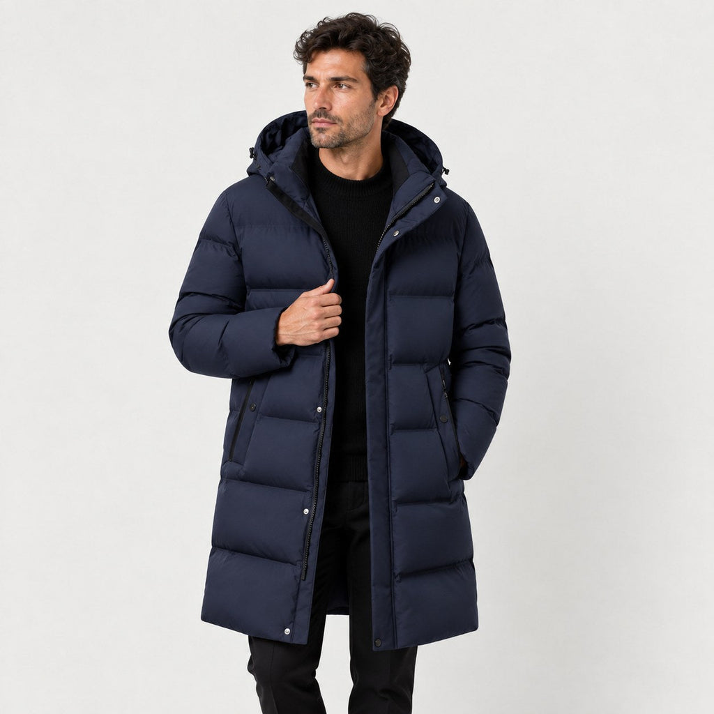 Men's longline hooded puffer coat in Navy | Rhossili – front view