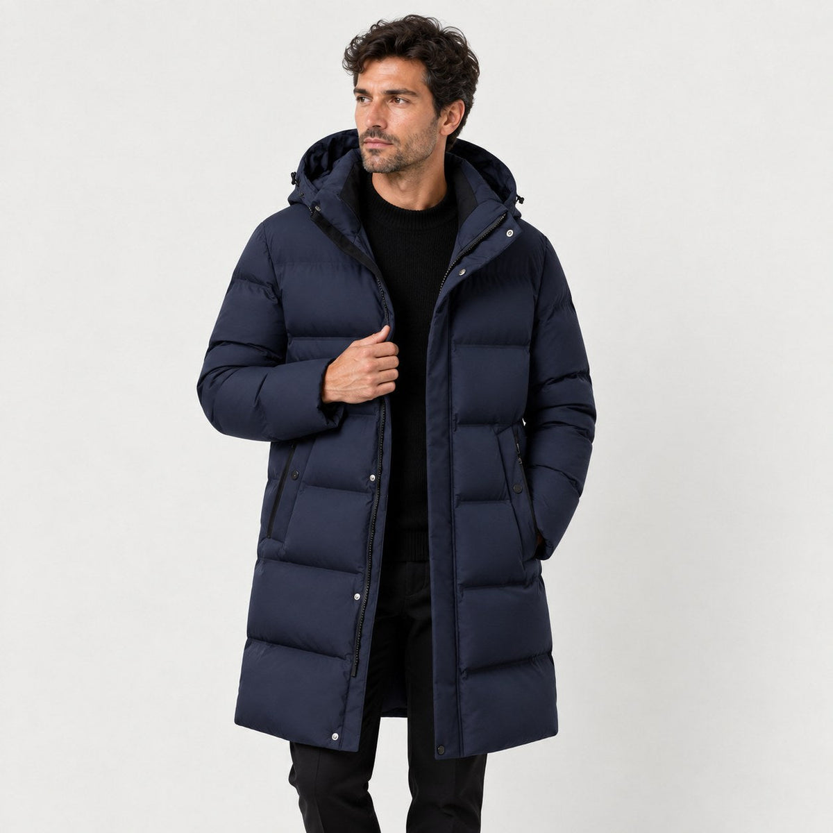 Men's longline hooded puffer coat in Navy | Rhossili – front view