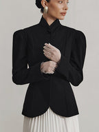 Women's fitted tailored blazer with structured shoulders