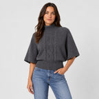 Women's cable knit turtleneck with cape sleeves in Dark Grey | Grinton – side view