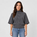 Women's cable knit turtleneck with cape sleeves in Dark Grey | Grinton – front view