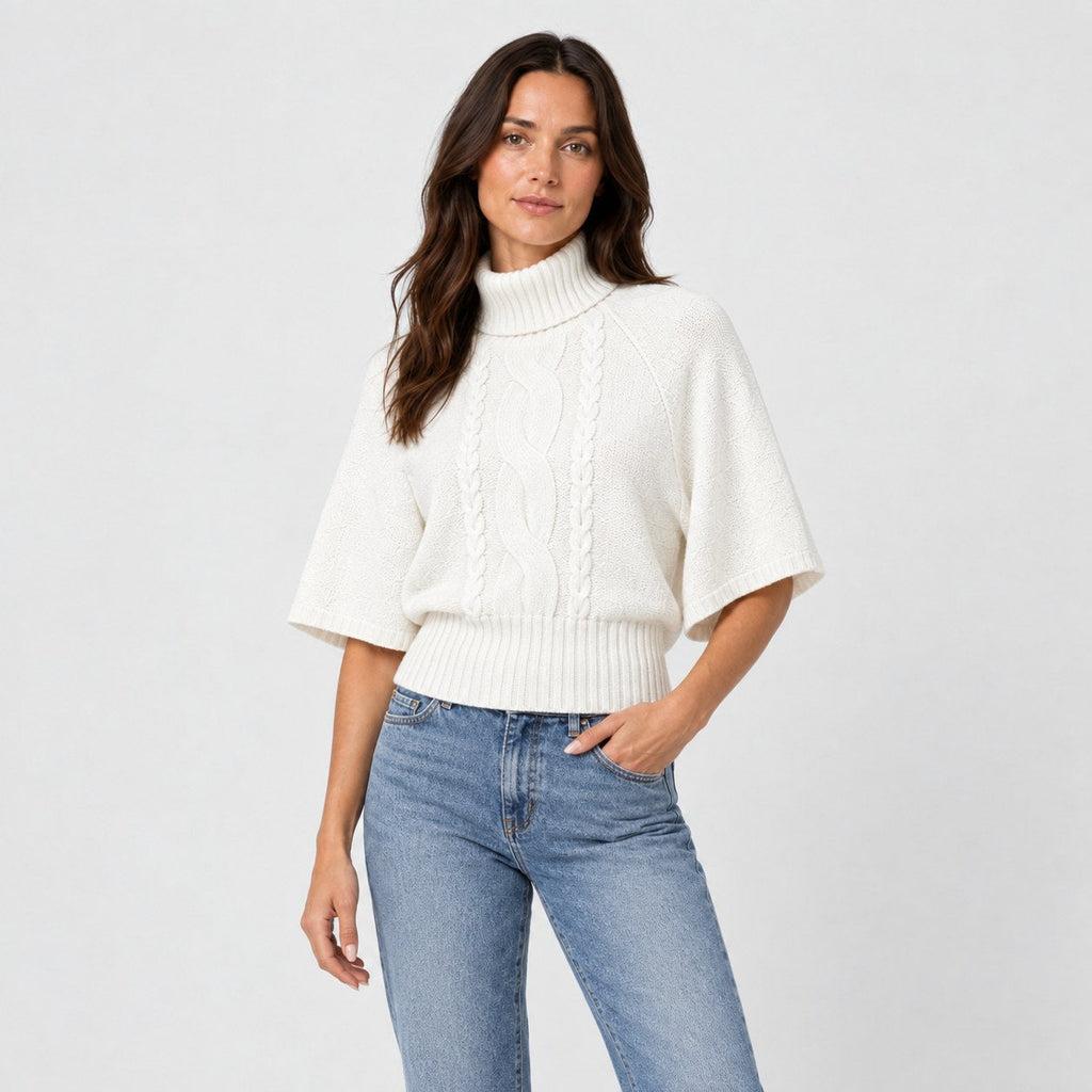Women's cable knit turtleneck with cape sleeves in White | Grinton – side view