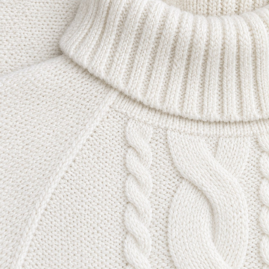 Women's cable knit turtleneck with cape sleeves in White | Grinton – detail view