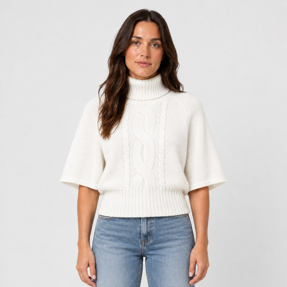 Women's cable knit turtleneck with cape sleeves in White | Grinton – front view