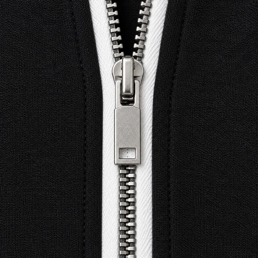 Women's quarter-zip and wide-leg trouser set in Black | Dorstone – detail view