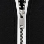 Women's quarter-zip and wide-leg trouser set in Black | Dorstone – detail view