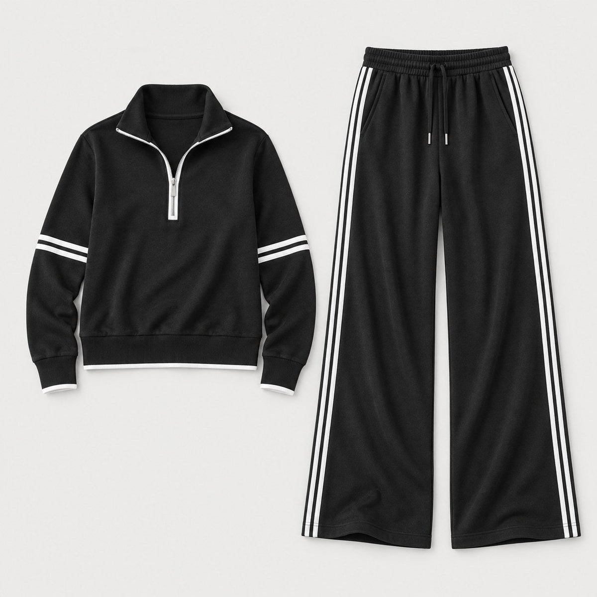 Women's quarter-zip and wide-leg trouser set in Black | Dorstone – front view